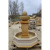 Kugelbrunnen auf einer Säule mit Wasserhahn aus Sandstein